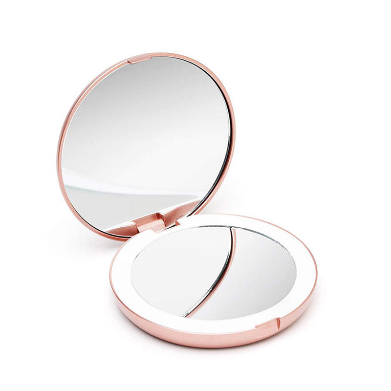 Espejo de maquillaje de mano rosa led plegable de aumento 10X con luces