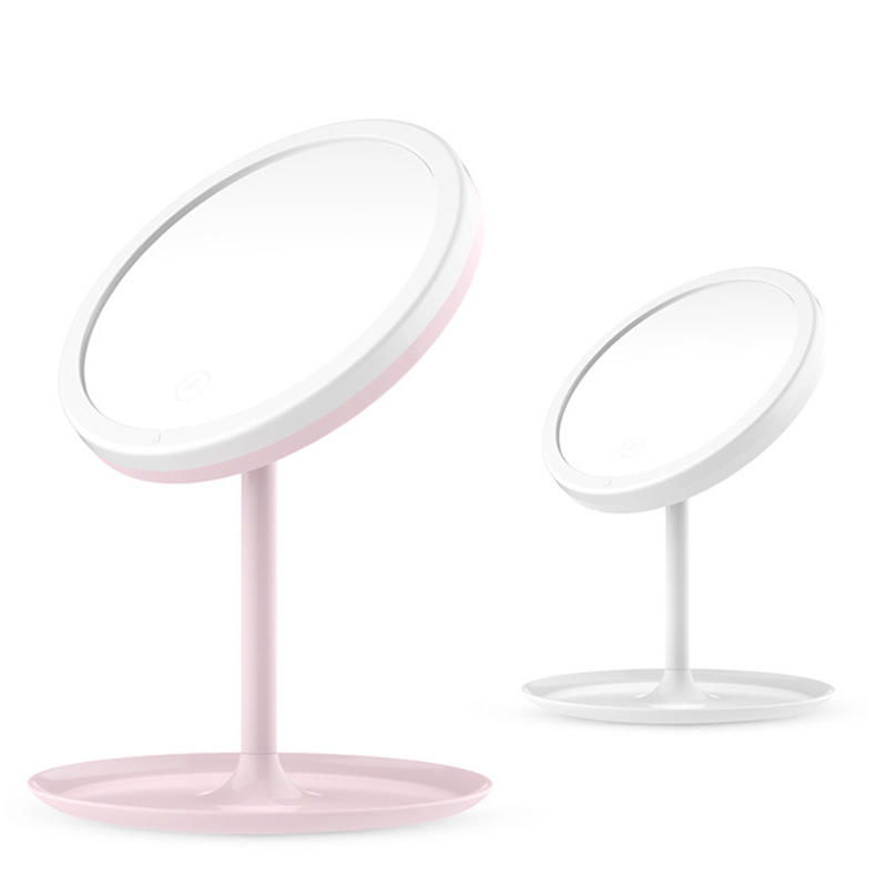 Espejo de maquillaje de mesa giratoria con luz LED rosa con base