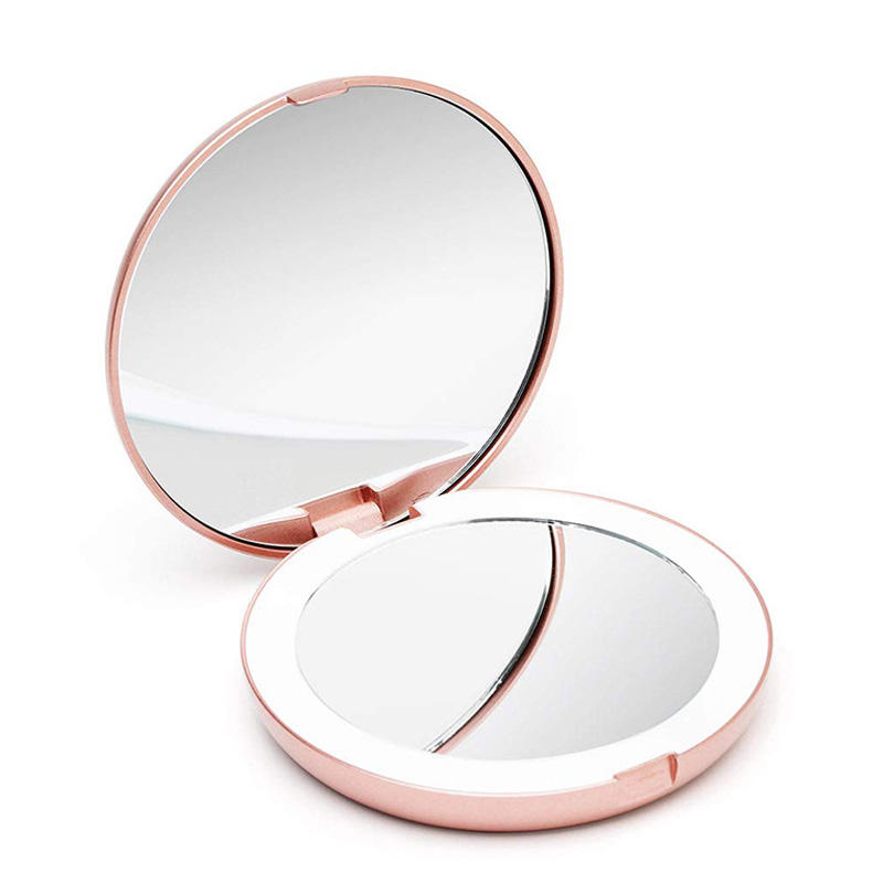 Espejo de maquillaje de mano rosa led plegable de aumento 10X con luces