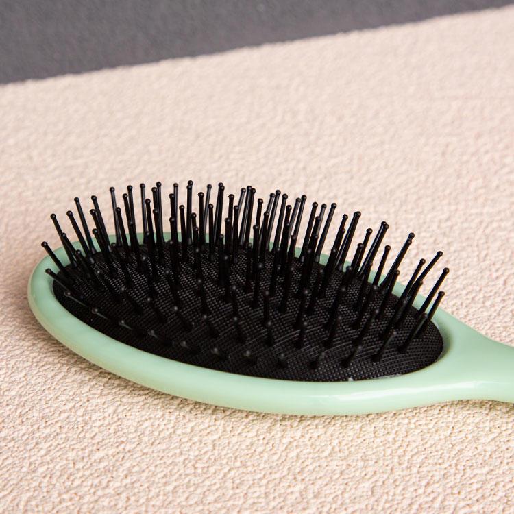 Cepillo para el cabello con almohadilla desenredante separable con cepillo limpiador