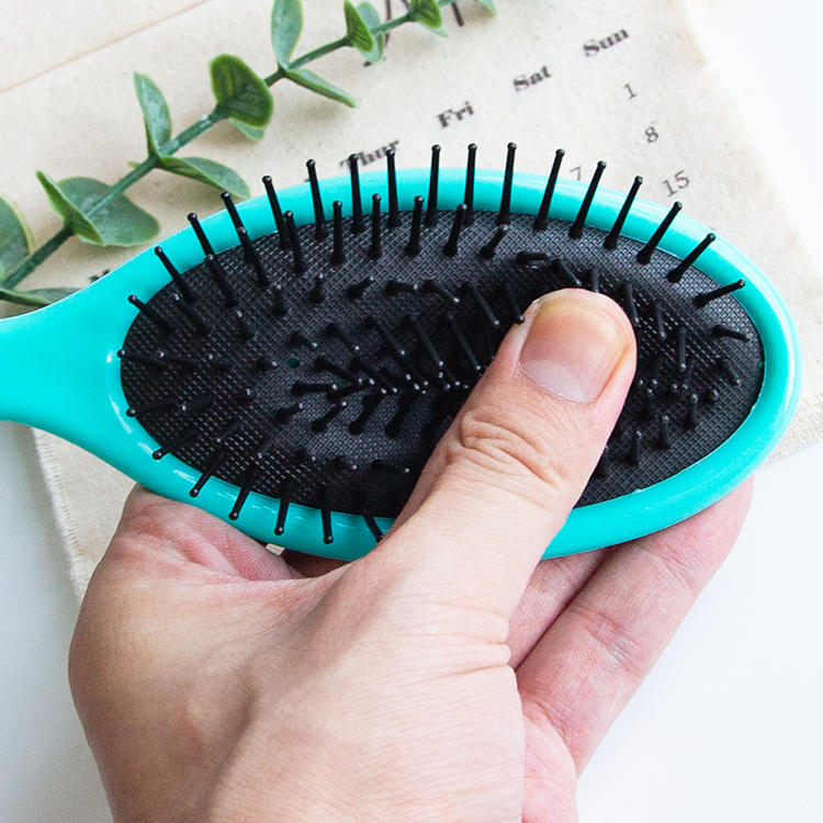 Cepillo de pelo con cojín desenredante de plástico con cerdas de nailon para cabello húmedo o seco