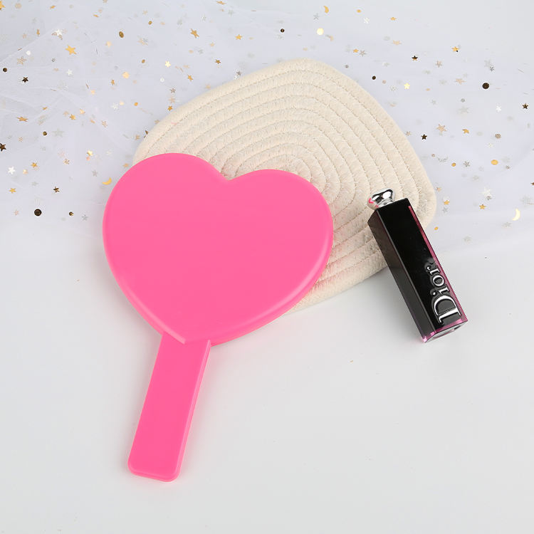 Espejo de vanidad de maquillaje de espejo de mano de plástico con forma de corazón para niñas