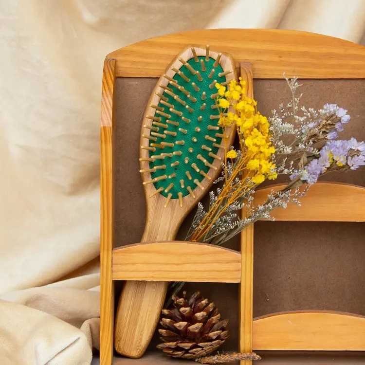 Cojín verde biodegradable que desenreda el cabello Cepillo para el cabello de bambú