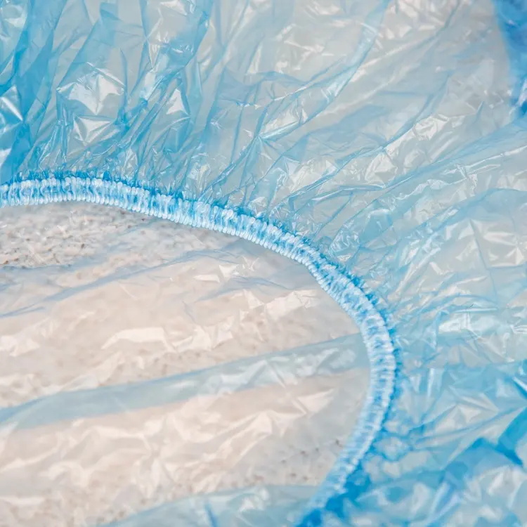 Gorro de baño elástico impermeable de 100 Uds. Gorro de ducha desechable azul